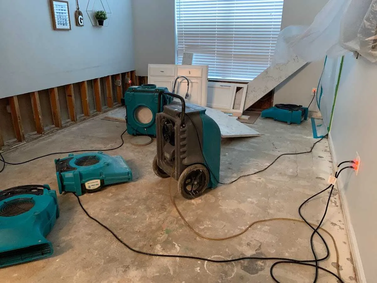 Dehumidifier in flood-cut room for Water Damage Restoration in La Vista